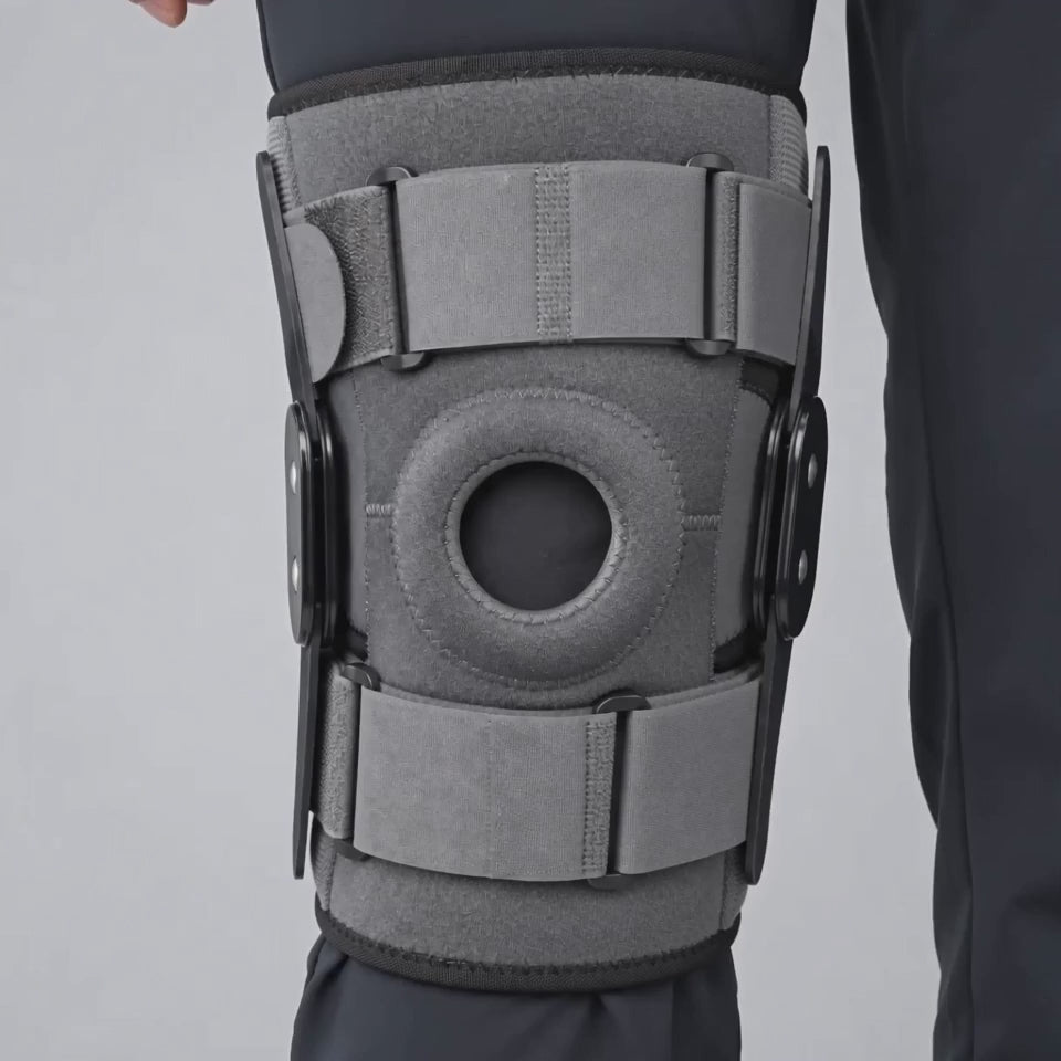 Load video: Hinged Knee Brace Metal Side Stabilizers Open Patella, Adjustable Straps Breathable Support, Men Women Sizes S-XXXL Running Sports Everyday Wear